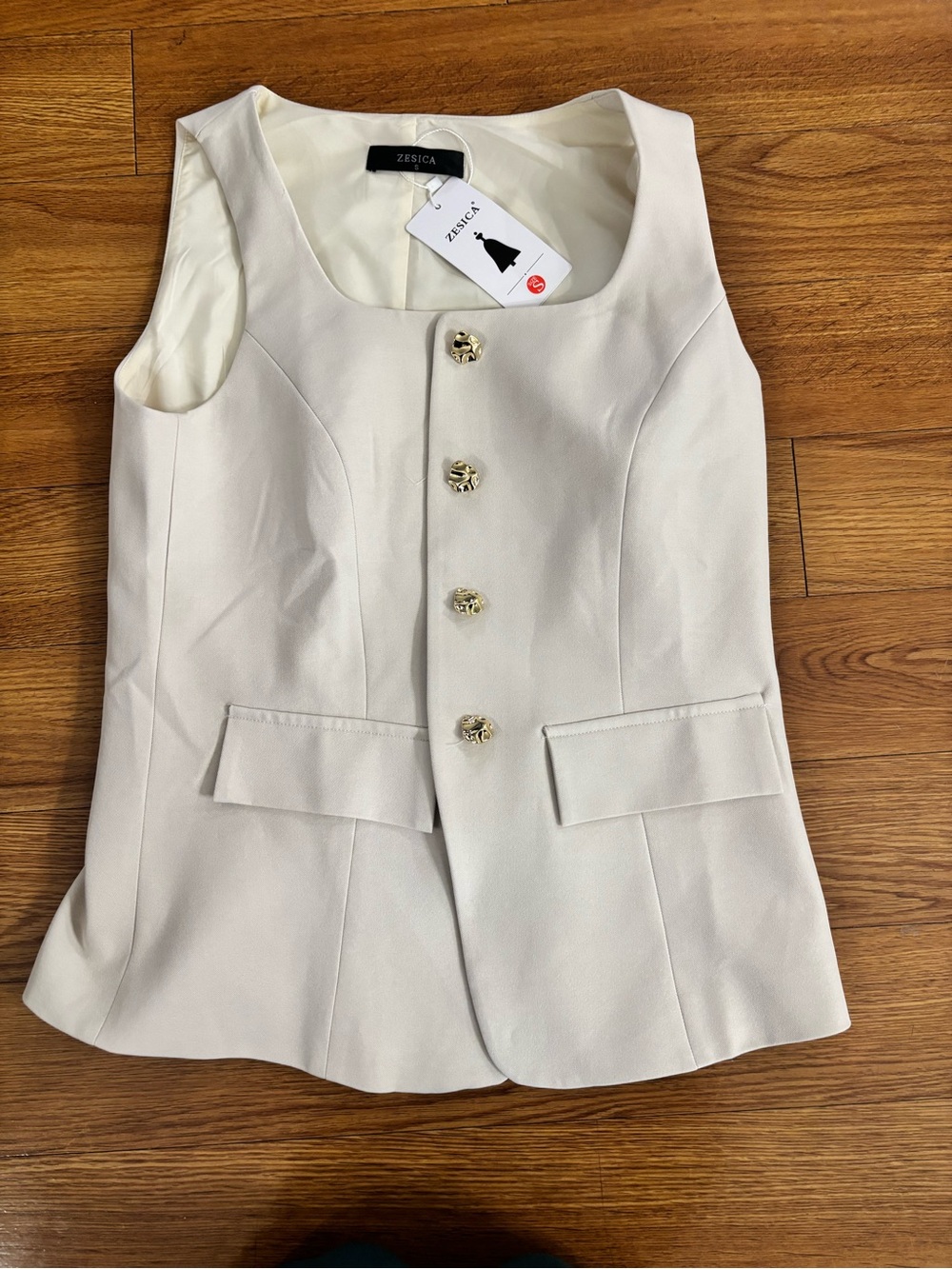 Zesica Cream Sleeveless Tailored Button Vest